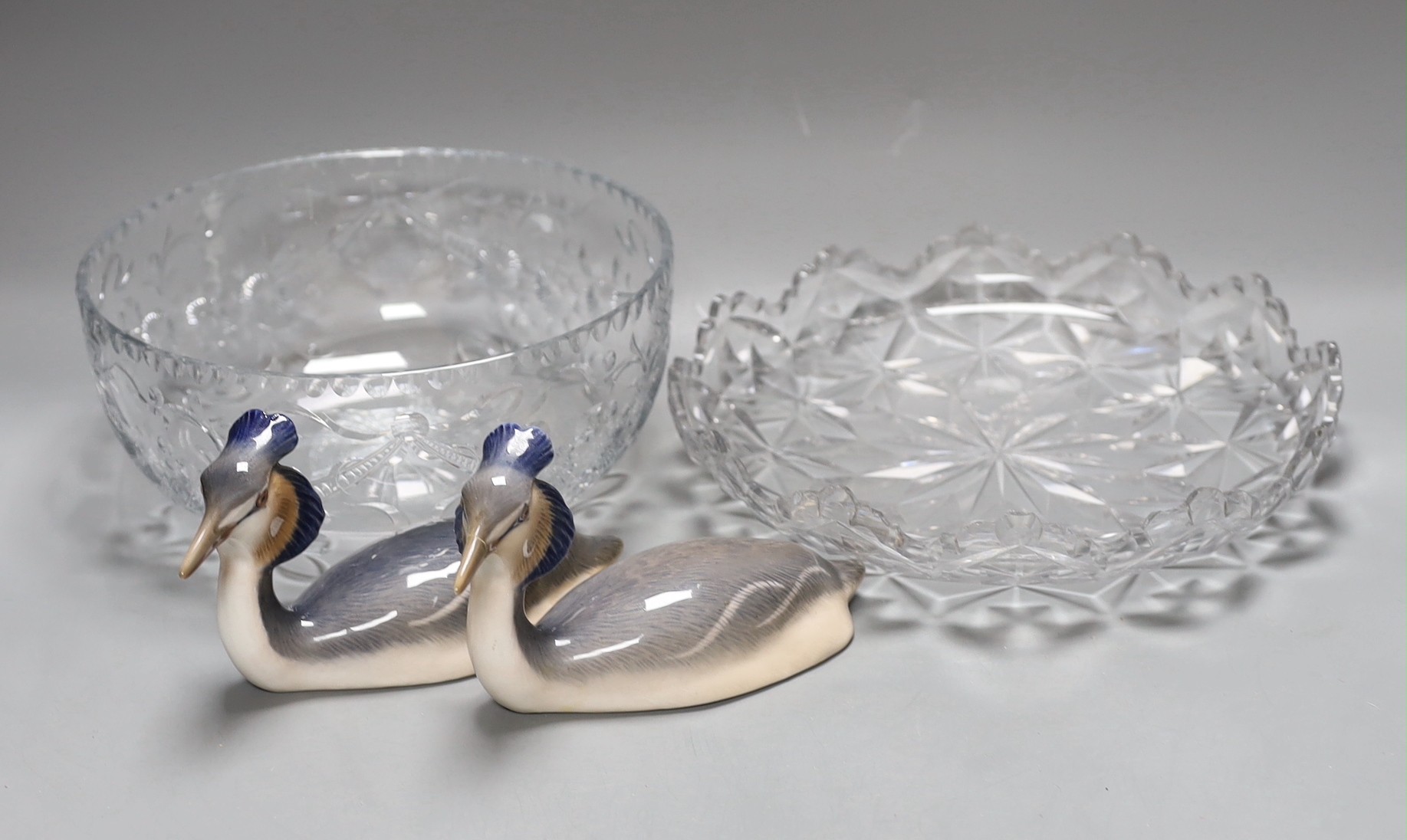 A pair of Royal Copenhagen great crested grebes and two cut glass bowls